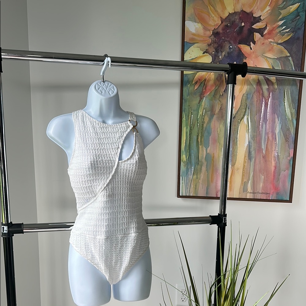 White Textured One-Piece Swimsuit. Never worn. Has liner intact